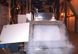 Pemasangan Dust Fogger pada head chute conveyor. Mengatasi Polusi Debu Batubara secara Efektif pada area jatuhan batubara